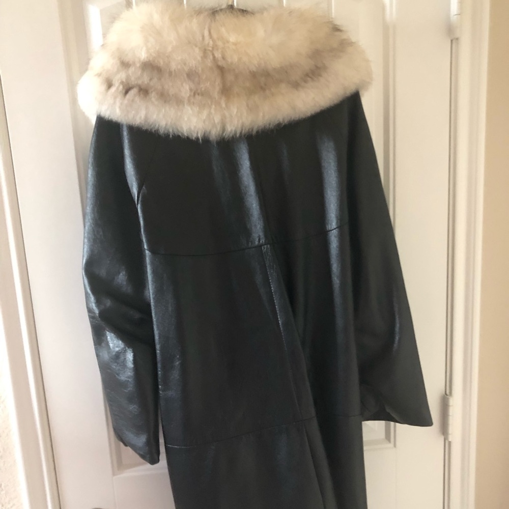 Leather coat with fur collar.